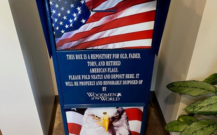 A mailbox wrapped in the colors of the US flag located in the lobby of the fire station